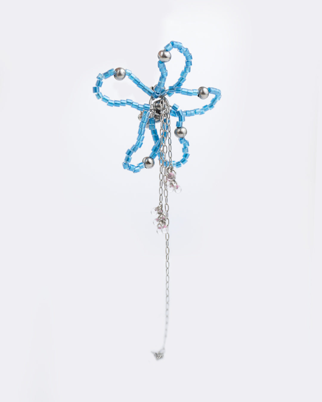 Earcuff «I can buy my blue flower»